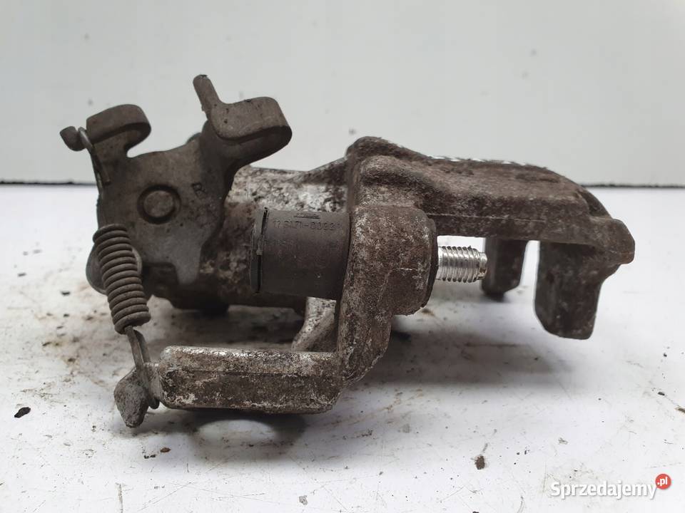 Toyota Yaris III TYLNY ZACISK HAMULCOWY prawy osobowe Rudka