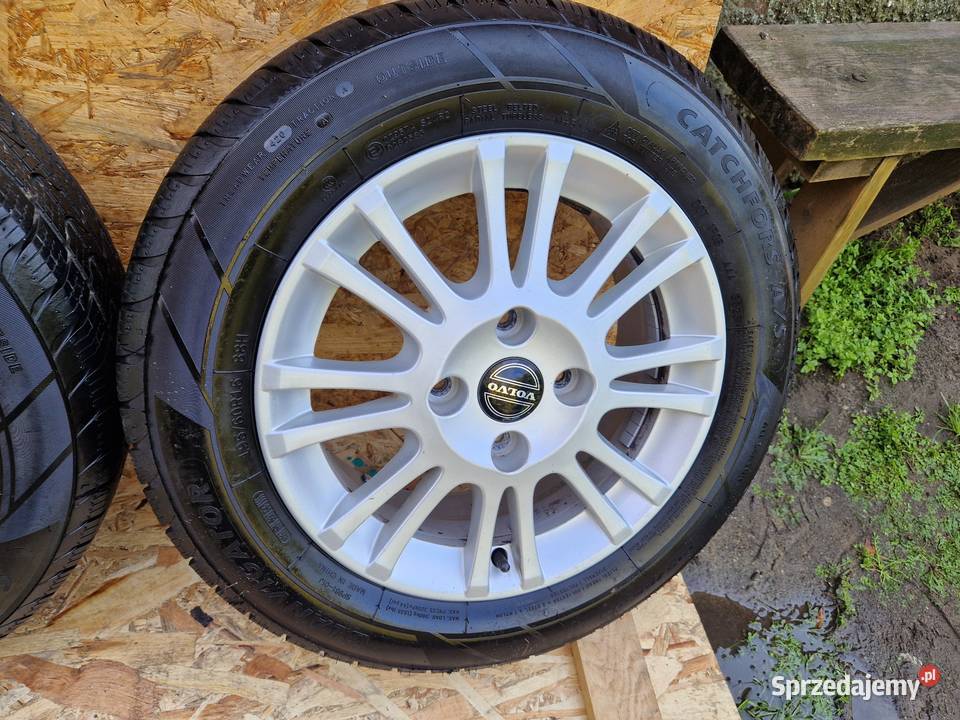 VOLVO FELGI ALUMINIOWE ET44 6Jx15 4X108 OPONY Słowikowo
