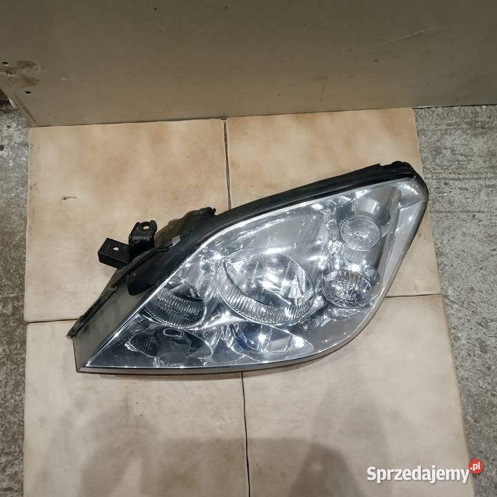 Nissan Primera P12reflektor lewy orginal osobowe dolnośląskie Wrocław sprzedam