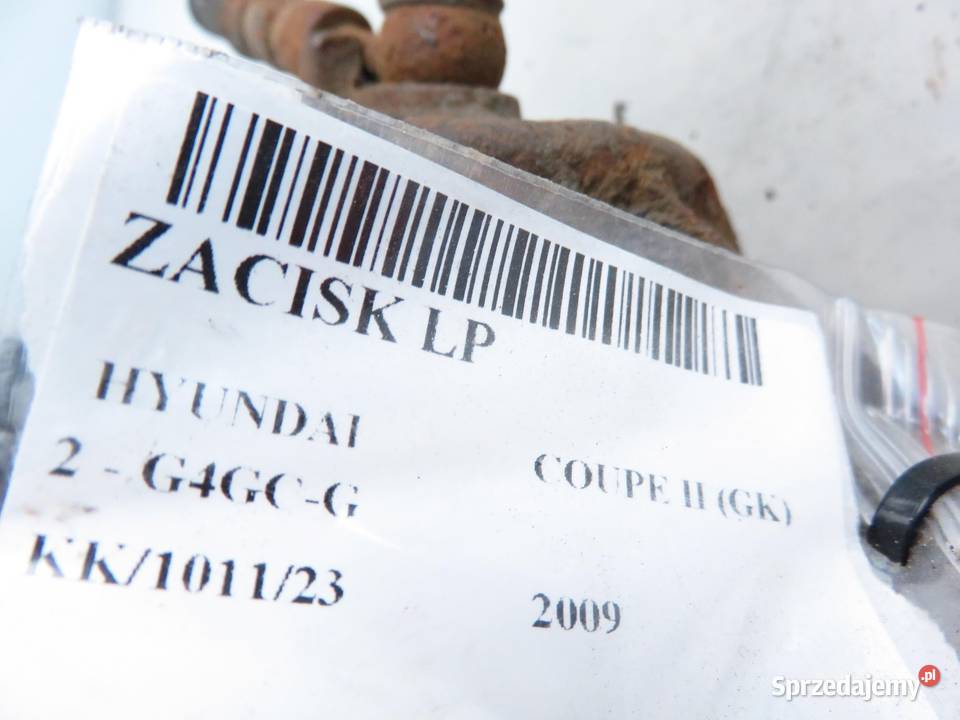 ZACISK LEWY PRZÓD HYUNDAI COUPE II 20 GLS