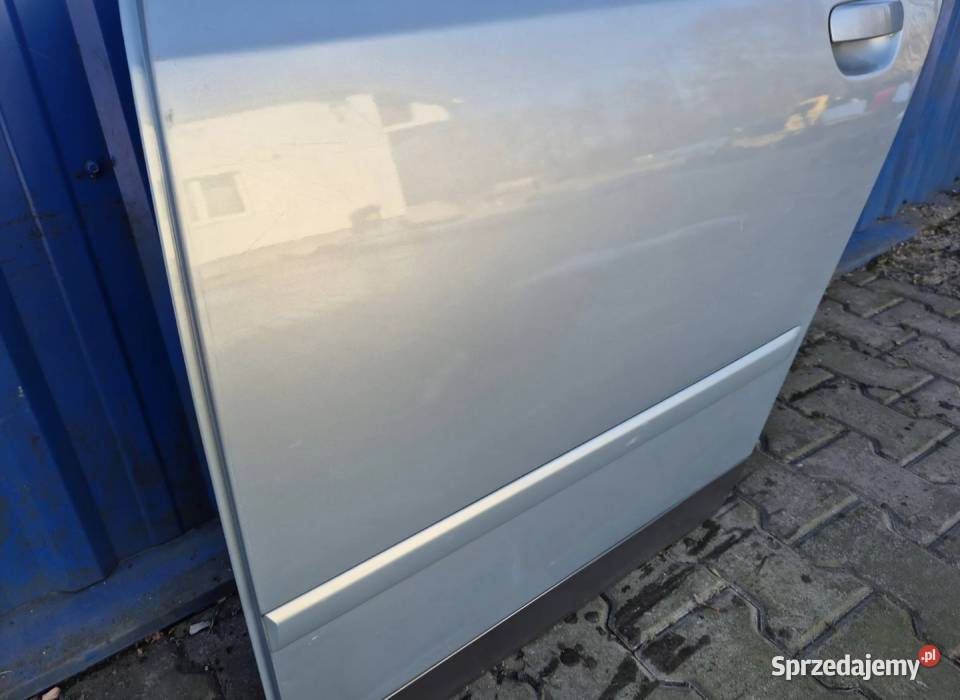 9 DRZWI TYŁ LEWY TYLNE LEWE AUDI A4 B6 KOMBI osobowe Działoszyce