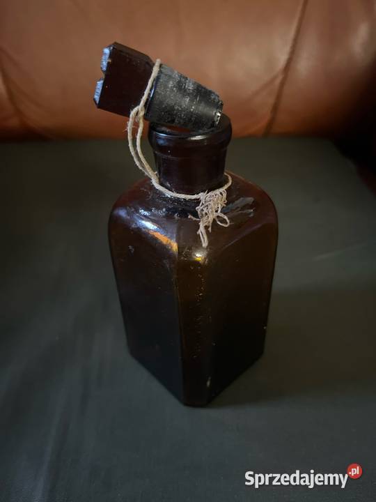 Brązowa buteleczka ze szlifem i szklanym korkiem