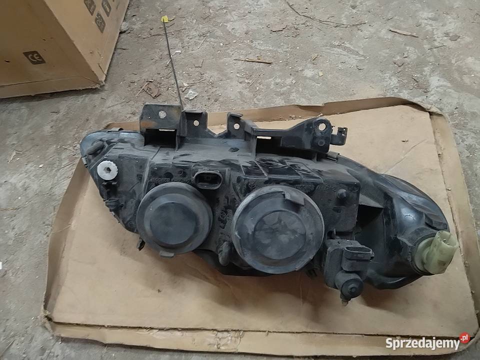 Lampa przednia lewa kierowcy renault laguna 1 Lampy przednie Jaszczów