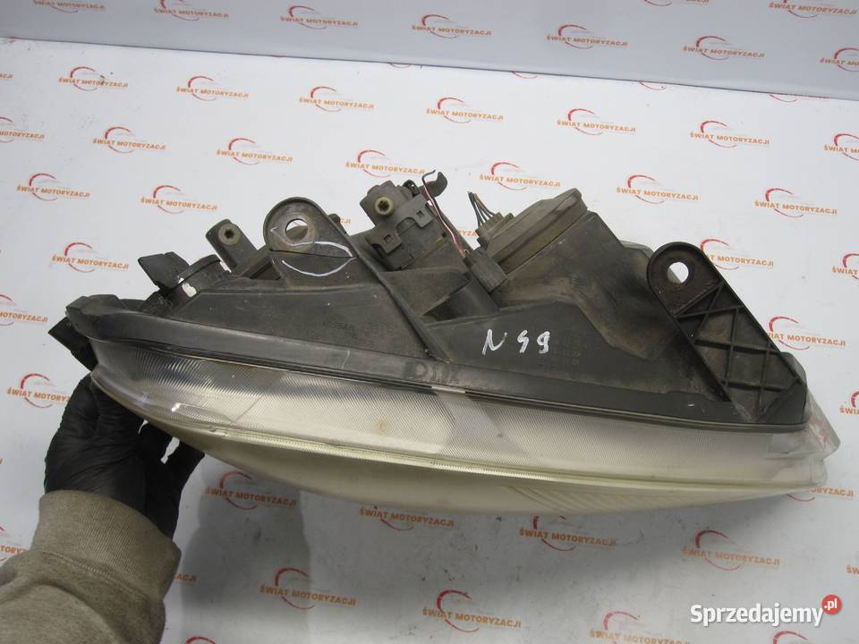 NISSAN QASHQAI I J10 07r lampa prawa przód Oświetlenie świętokrzyskie Kielce