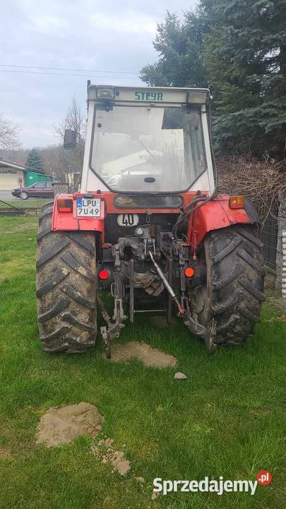 John Deere 105 z turem samopoziomującym tuz