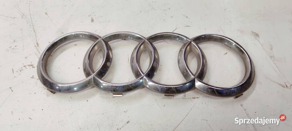 EMBLEMAT ZNACZEK GRILLA PRZÓD AUDI A1 8X0853605 Przystajń