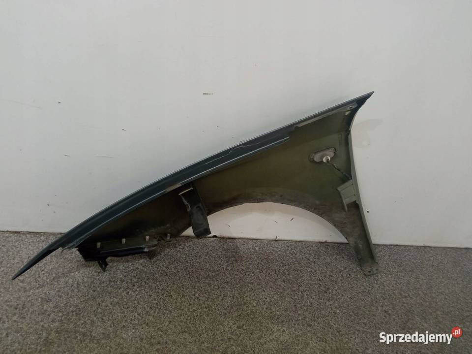 BŁOTNIK PRAWY PRZÓD SZARY Seat Ibiza IV 2008