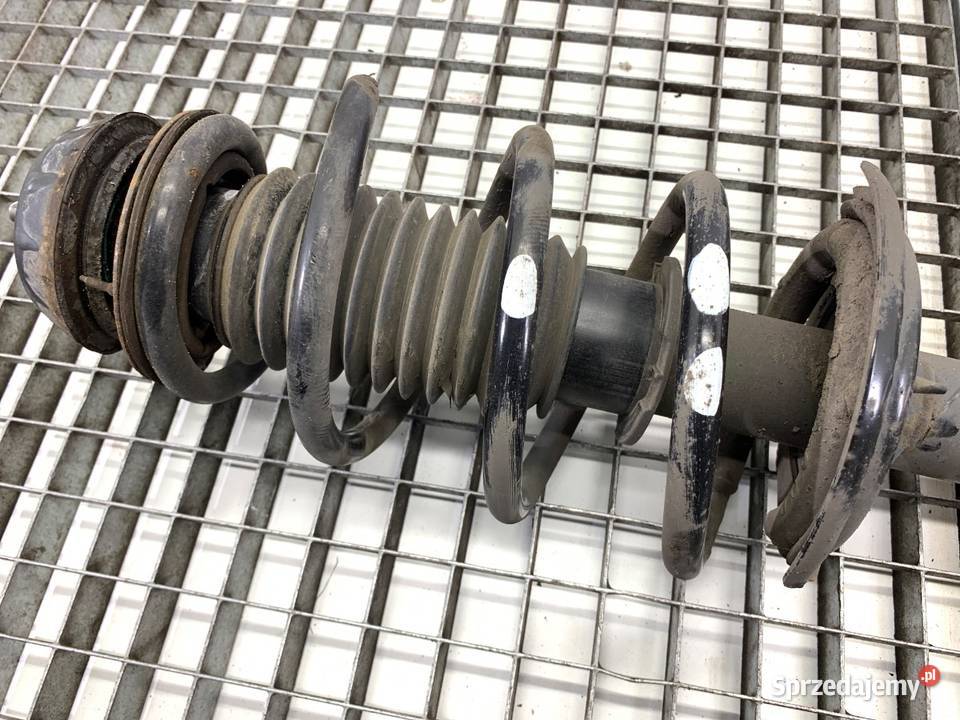 AMORTYZATOR PRAWY PRZÓD ZE SPRĘŻYNĄ KIA VENGA 14