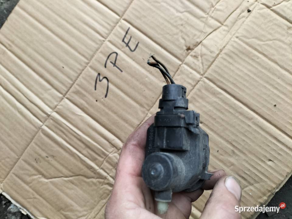 SILNICZEK REGULACJI LAMPY RENAULT 7700420736 Kamień-Kolonia