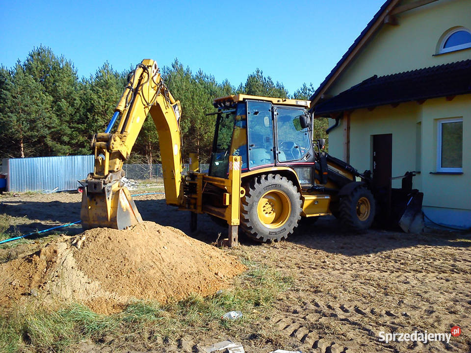 Usługi koparkoładowarką CAT Usługi transportowe