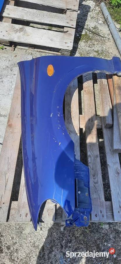 Blotnik lewy przód Nissan Almera n16 polift