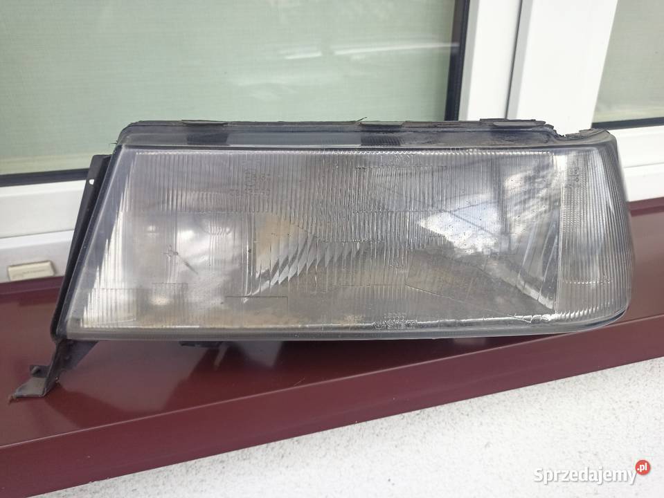 Lancia Thema I LIFT lampa przednia reflektor