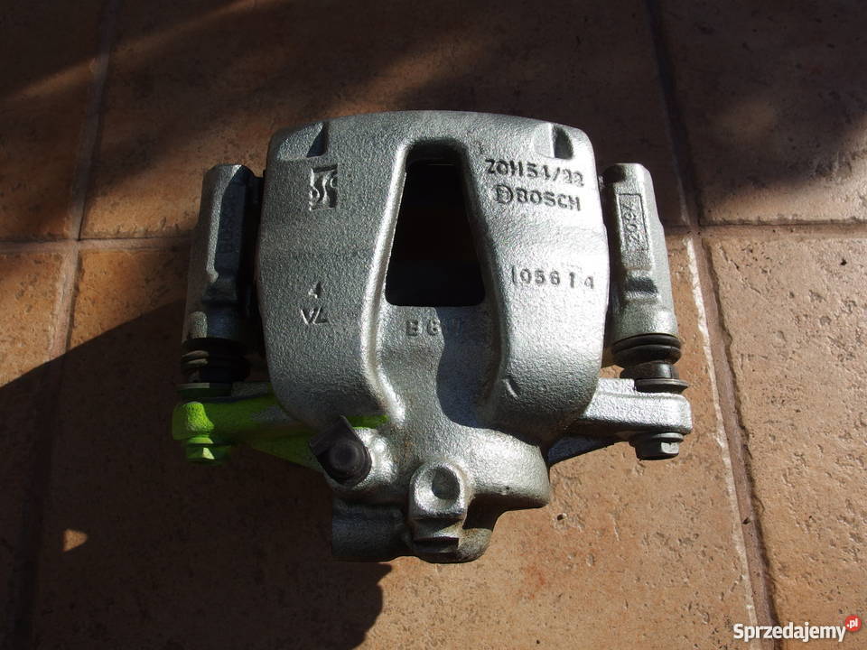 Zacisk Hamulcowy lewy przód Opel Adam