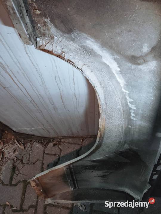 Oryginalny prawy przedni błotnik W124 C124 sprzedam
