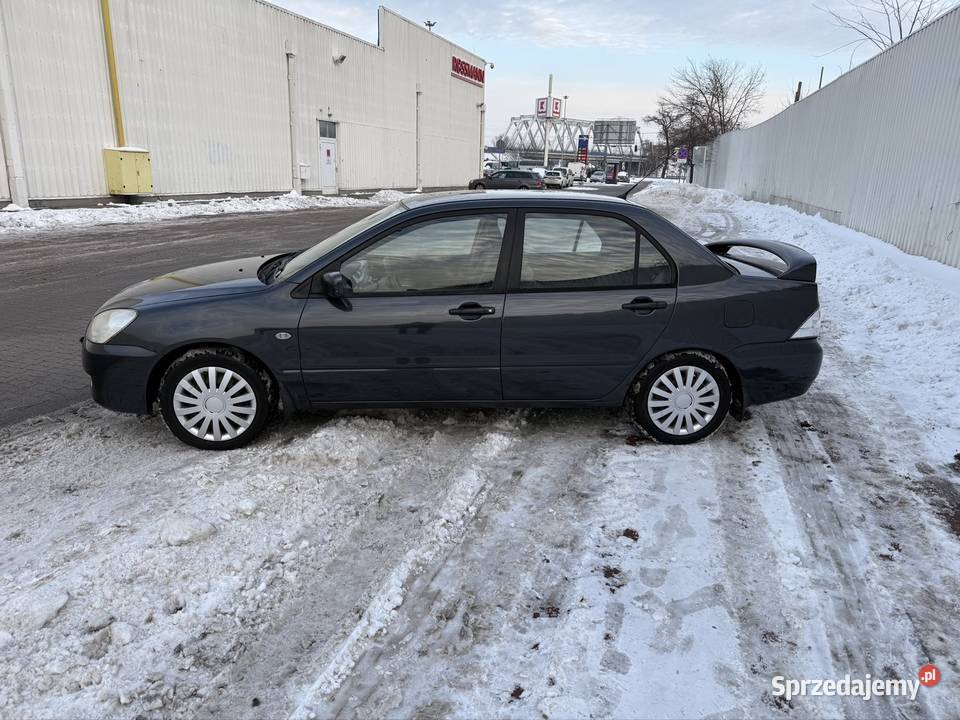 Mitsubishi lancer salon Polska 16 benzyna jeden ABS Warszawa sprzedam