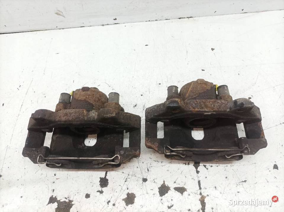 ZACISK HAMULCOWY PRAWY LEWY PRZÓD 12 B KPL Opel Zaciski i jarzma