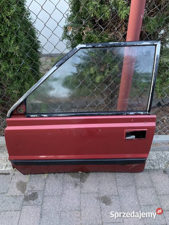 Drzwi lewy przód z szybą Plonez Caro Pruszków