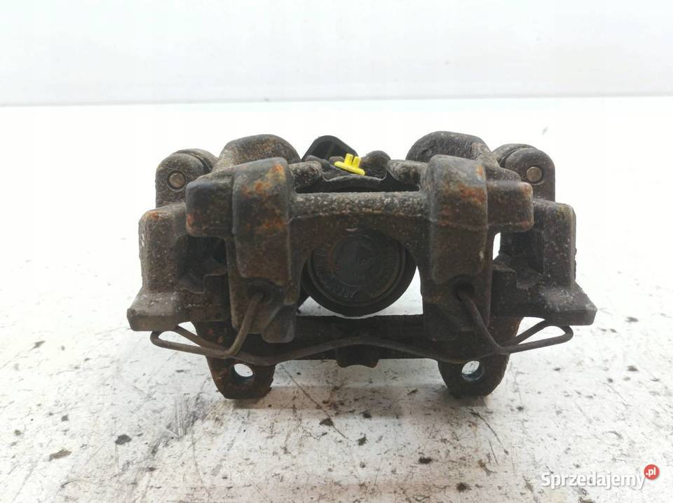 ZACISK HAMULCOWY PRAWY TYŁ 20 TDCI ELEKTRYCZNY