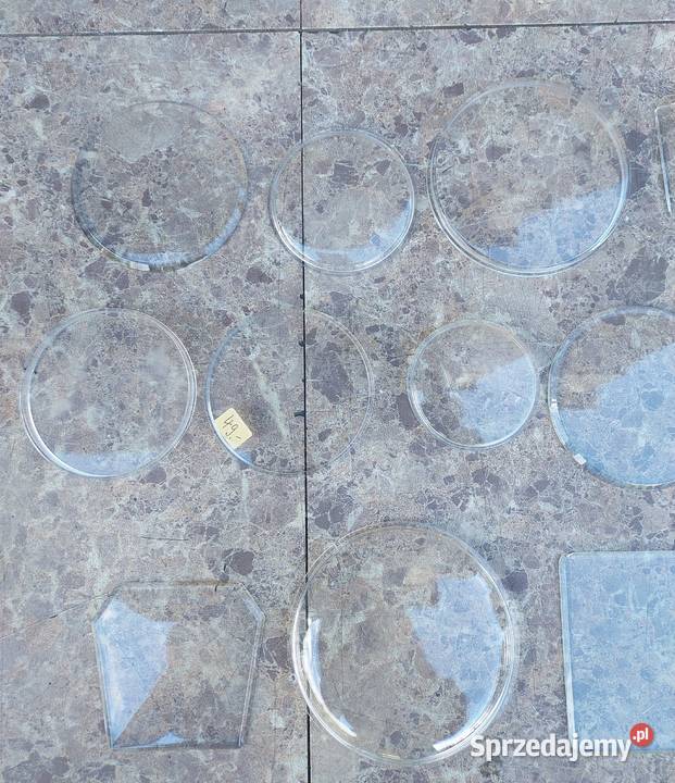 Zestaw 27 plexi szkiełek szybek małych zegarów Tczew