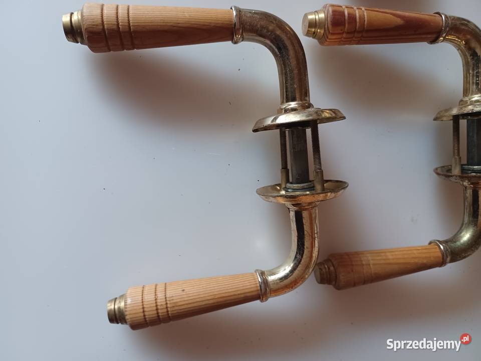 Dwa komplety klamek Mosiądz drewno wielkopolskie Poznań