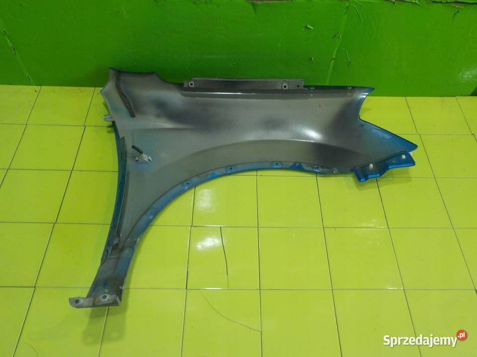 NISSAN QASHQAI I J10 07r blotnik lewy przod osobowe Suków