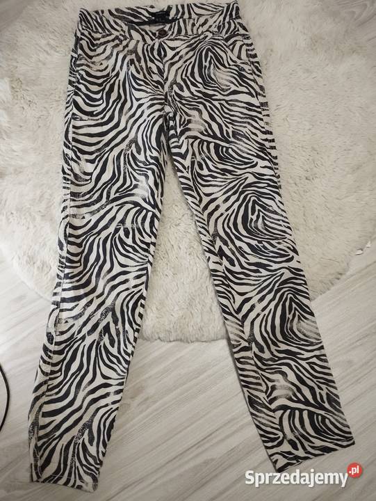 Stylowe spodnie LINDEX w modny wzór zebry Mysłaków sprzedam