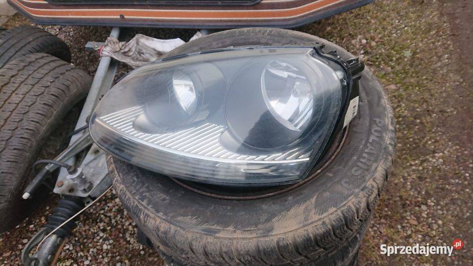 Oryginalna lampa przód Golf V czarny środek Lewa osobowe pomorskie Garcz