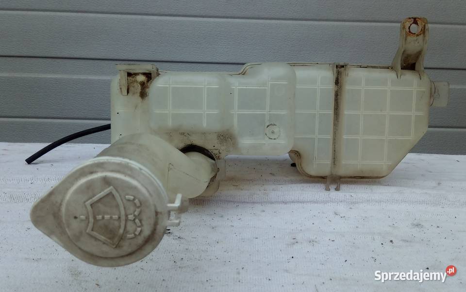ZBIORNICZEK SPRYSKIWACZY MITSUBISHI PAJERO PININ Części samochodowe Mielęcin