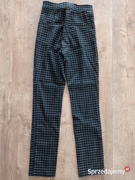 Spodnie w kratkę marki HM