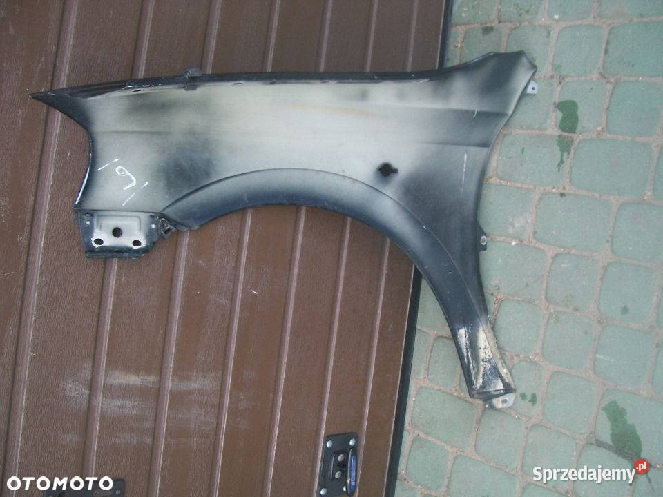 Błotnik prawy Astra II G bez rdzy Radom