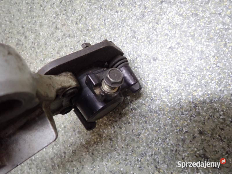 ZACISK HAMULCA HAMULCOWY TYŁ JARZMO KAWASAKI KLR