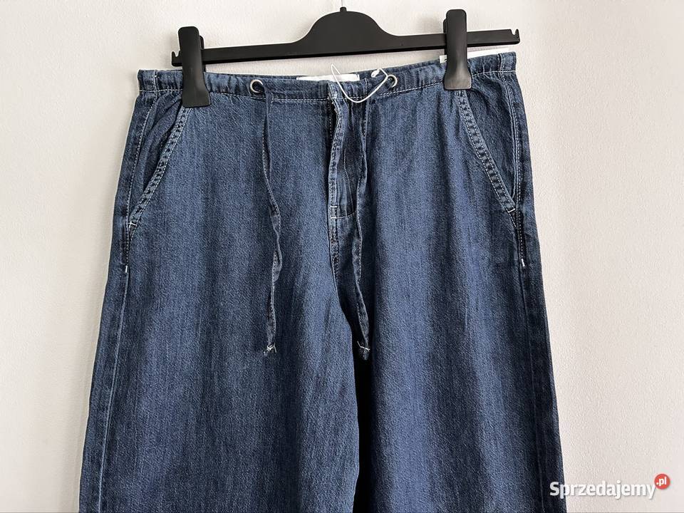 Spodnie szerokie nogawki XS jeansy damskie niebieski Spodnie