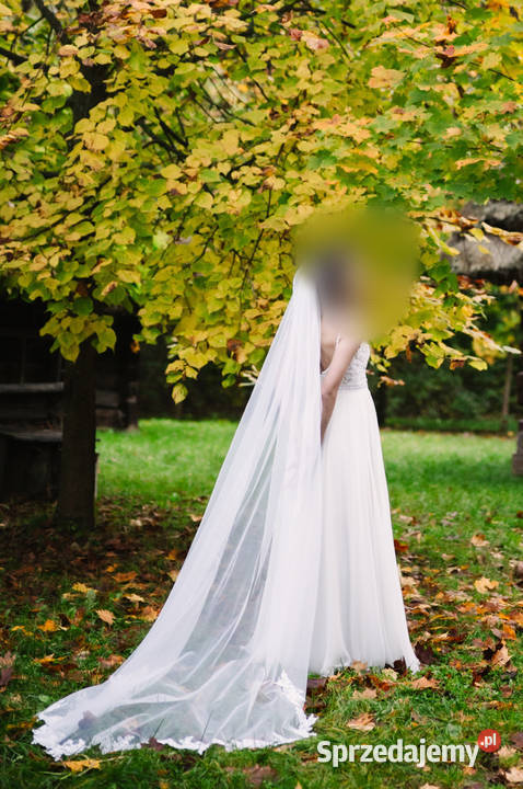 Elegancka sukienka ślubna z rozcięciem podkarpackie