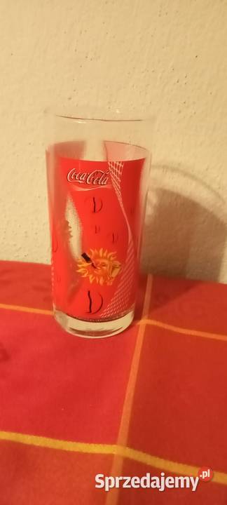 Coca cola szklanka słońce z pucharem