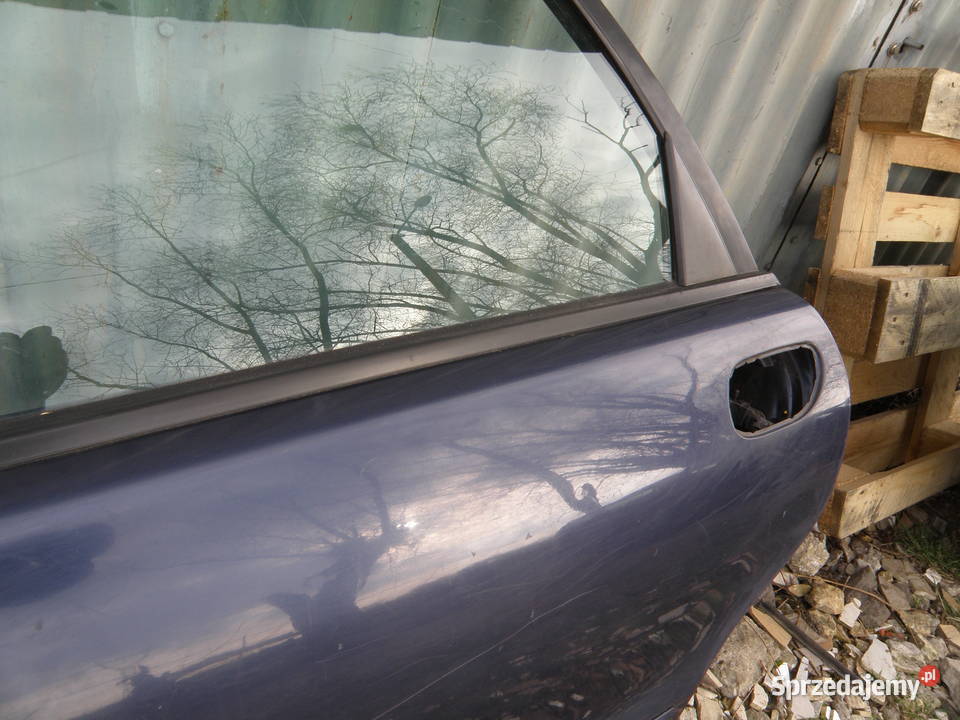 Drzwi tylne prawe lewe volvo v40 granatowe 34322 Rok produkcji 2003 Kraków