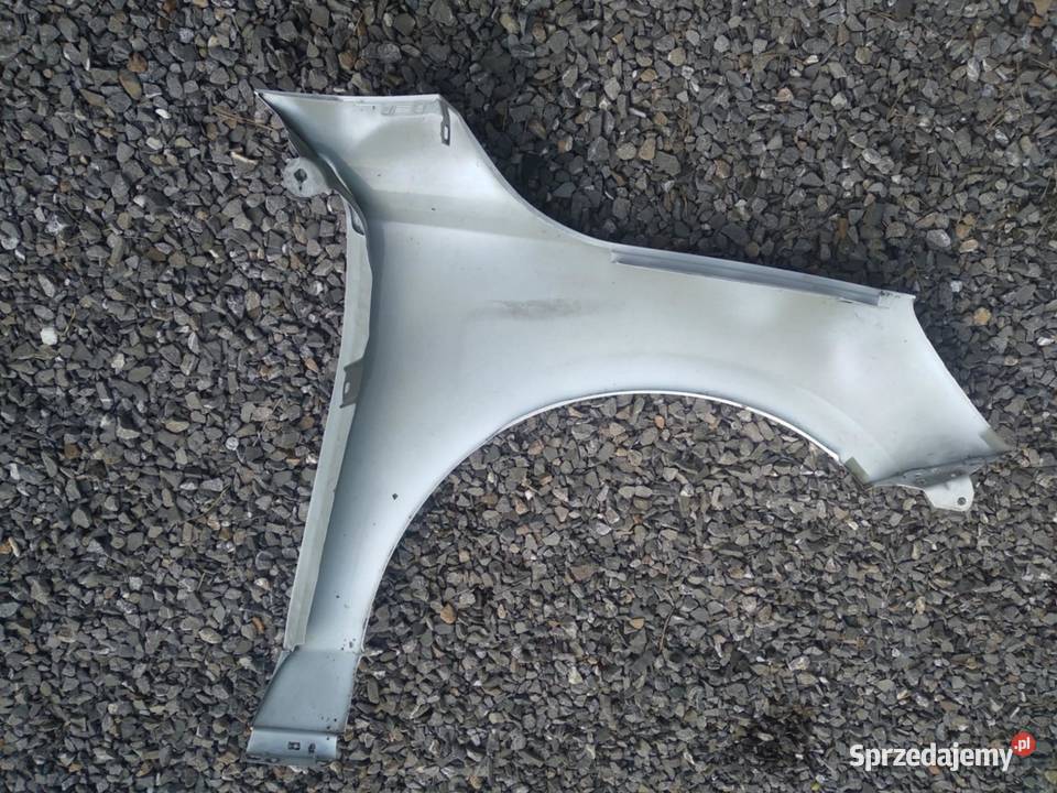 FORD FOCUS MK4 1823r Błotnik lewy przód Żory