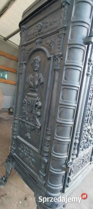 Zabytkowy kominek żeliwny 7 kW ozdobna obudowa w