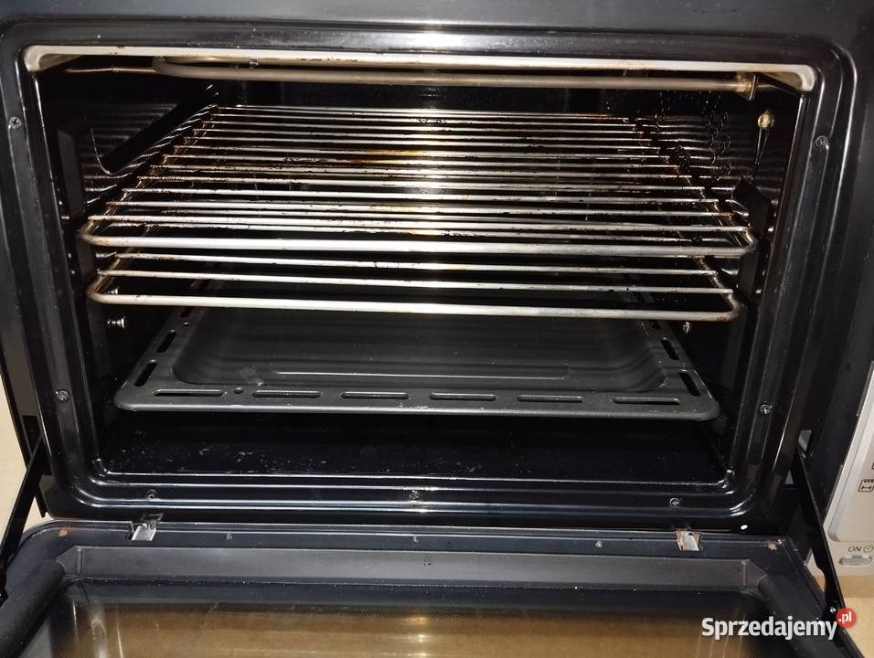 Piekarnik elektryczny DeLonghi 32L Kuchenki i piekarniki Łask