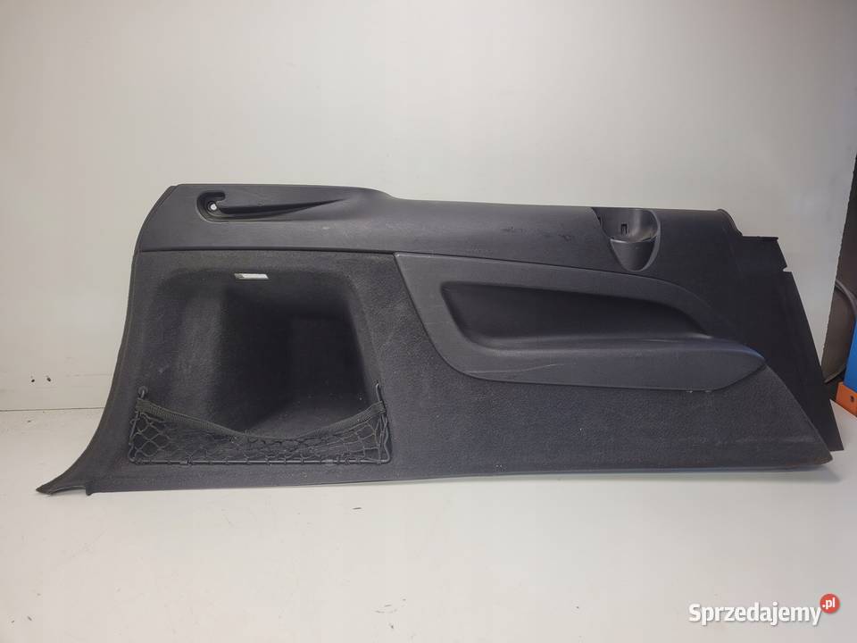 BOCZEK BAGAŻNIKA LEWY AUDI Q7 4L 4L0863879T