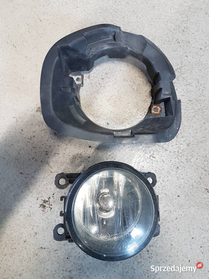 DACIA SANDERO I 2009 HALOGEN UCHWYT LEWY PRAWY