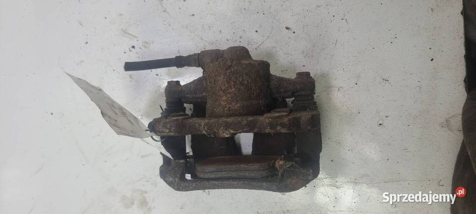 ZACISK HAMULCOWY PRZÓD LEWY OPEL CORSA D Lipno