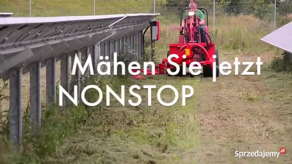 Kosiarka koszenie trawy wokół słupów farm Warszawa