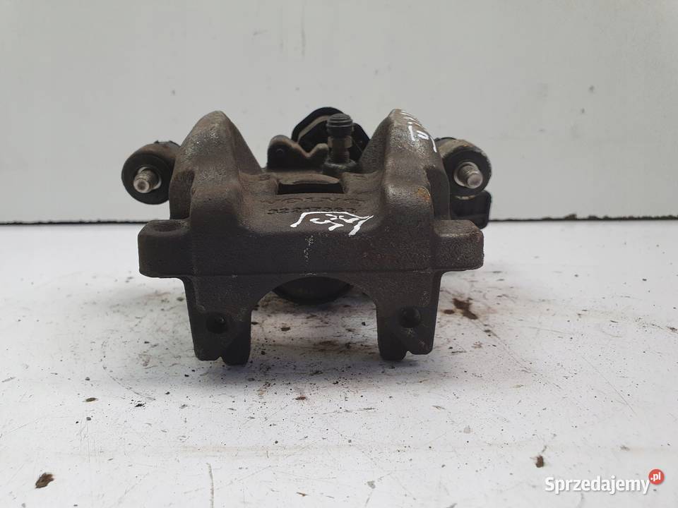 Volvo XC60 II TYLNY ZACISK HAMULCOWY LEWY tył Janów