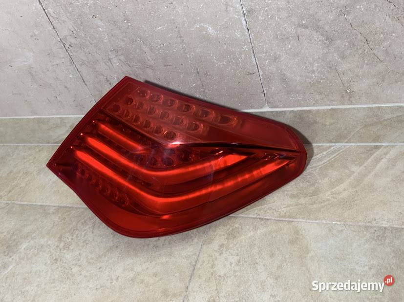 Lampa lewa tylna tył BMW F01 F02 7 7182198 osobowe Lampy tylne