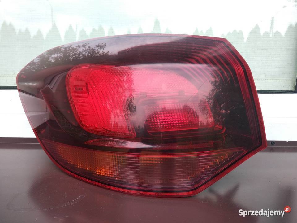 Opel Astra J kombi lampa tył tylna lewa narożna osobowe Sieradz