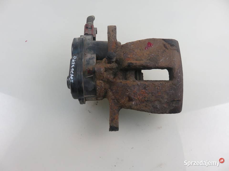 ZACISK LEWY TYŁ AUDI A4 B8 18 TFSI osobowe Zaciski i jarzma