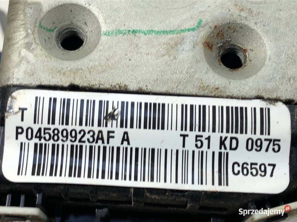 ZAMEK DRZWI LEWY TYŁ JEEP GRAND CHEROKEE WK SUV