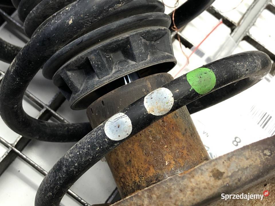 AMORTYZATOR LEWY PRZÓD ZE SPRĘŻYNĄ PEUGEOT 207