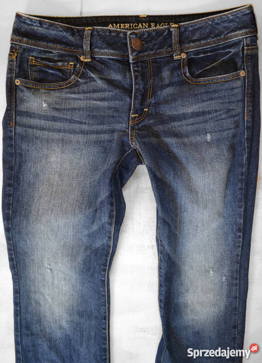 modne jeansowe spodnie z przecieraniami 40 L