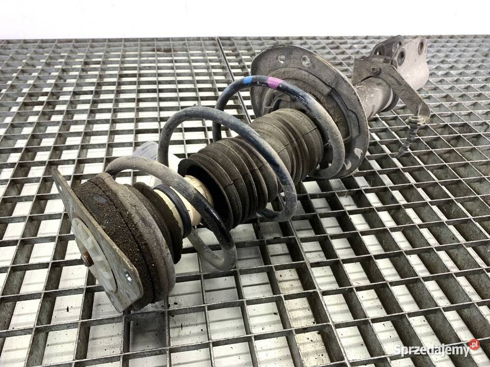 AMORTYZATOR LEWY PRZÓD ZE SPRĘŻYNĄ RENAULT